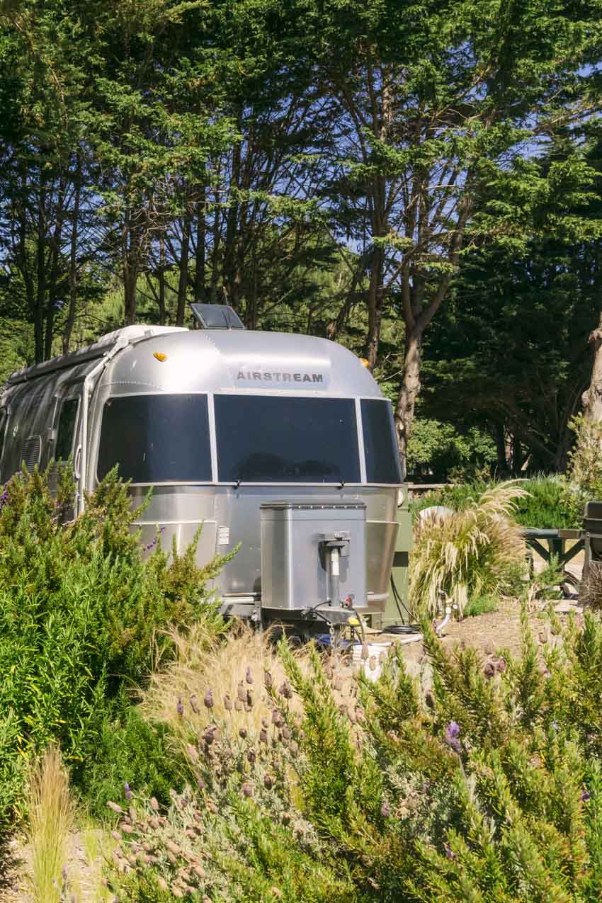 air stream style camper at campground