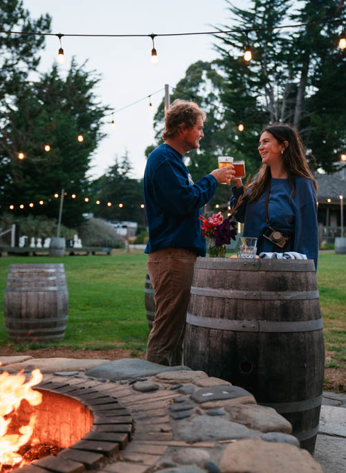 Man and a woman in an outdoor event space